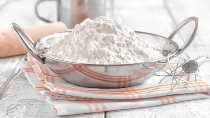 how many cups is 100 grams of flour
