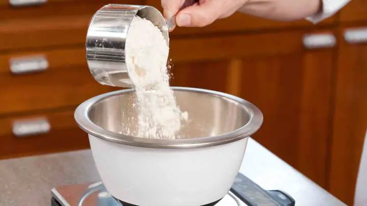  how many cups is100 grams of flour- cheffist